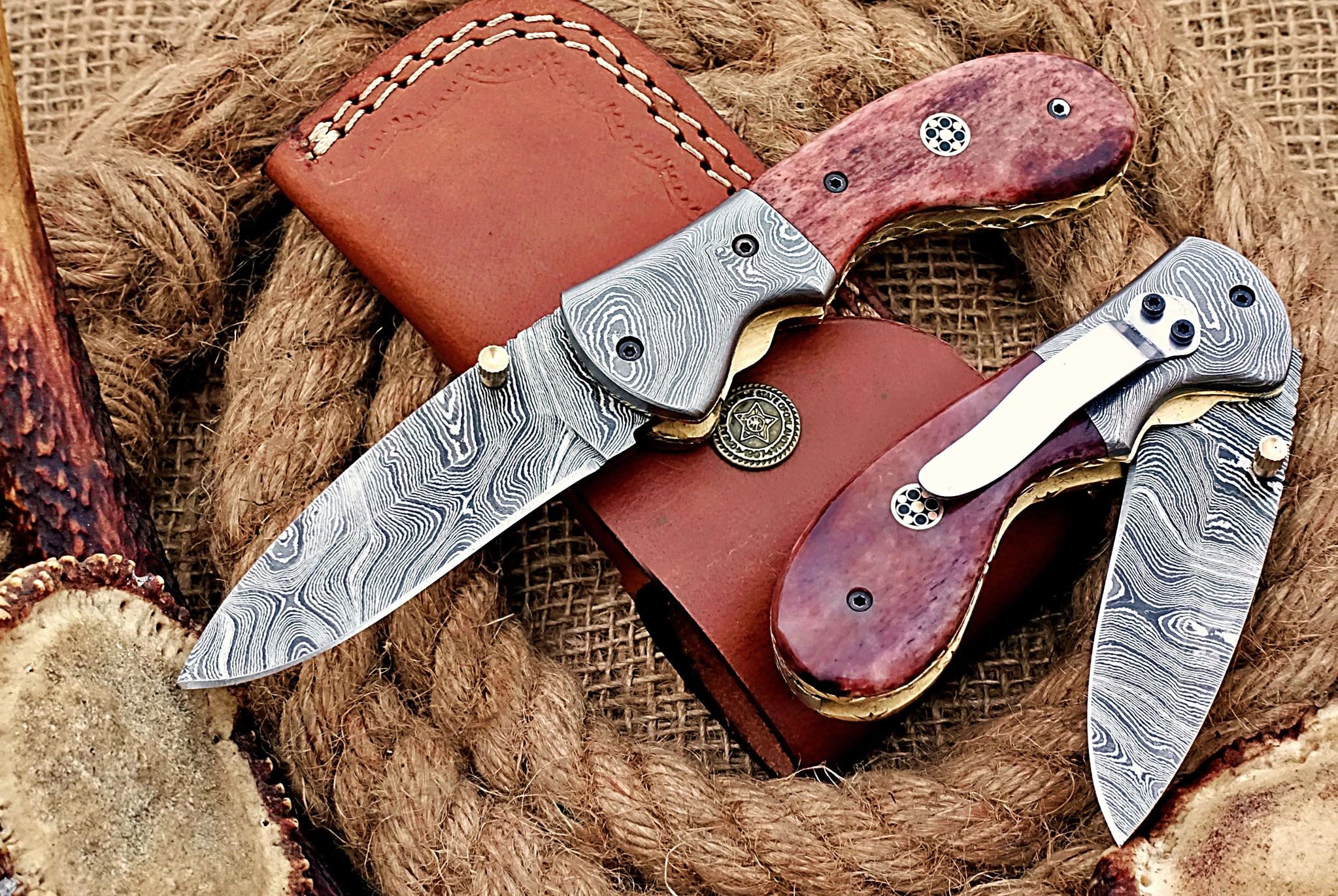https://damascuscollection.com/wp-content/uploads/2023/11/Custom-Handmade-Damascus-Steel-Stunning-Folding-Knife-with-Amazing-Purple-Colored-Bone-Handle-Fk-71-1.webp